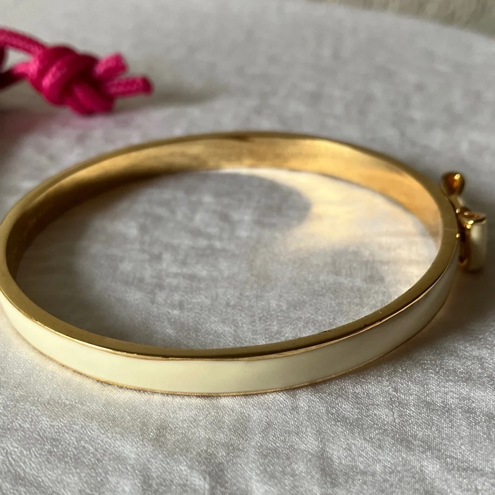Kate Spade: “Take a Bow” Cream & Gold Tone Bow Bracelet & Dust Bag - Picture 10 of 11